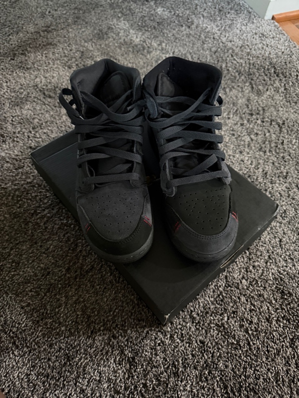 Jordan Kids Black High-Top Sneakers with Red Stitch Accents